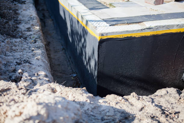 Professional Basement Waterproofing technician working in Grandview, TN